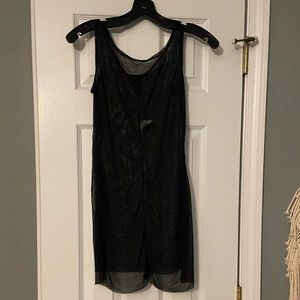 See-through black mesh cover. Worn once for recital.